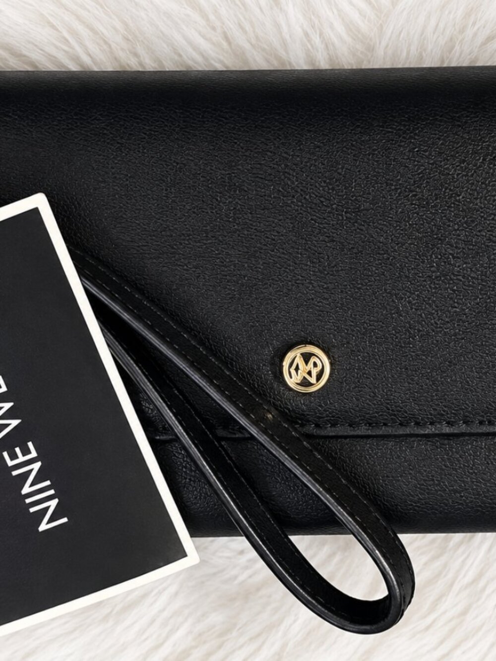 None West Wristlet Wallet.